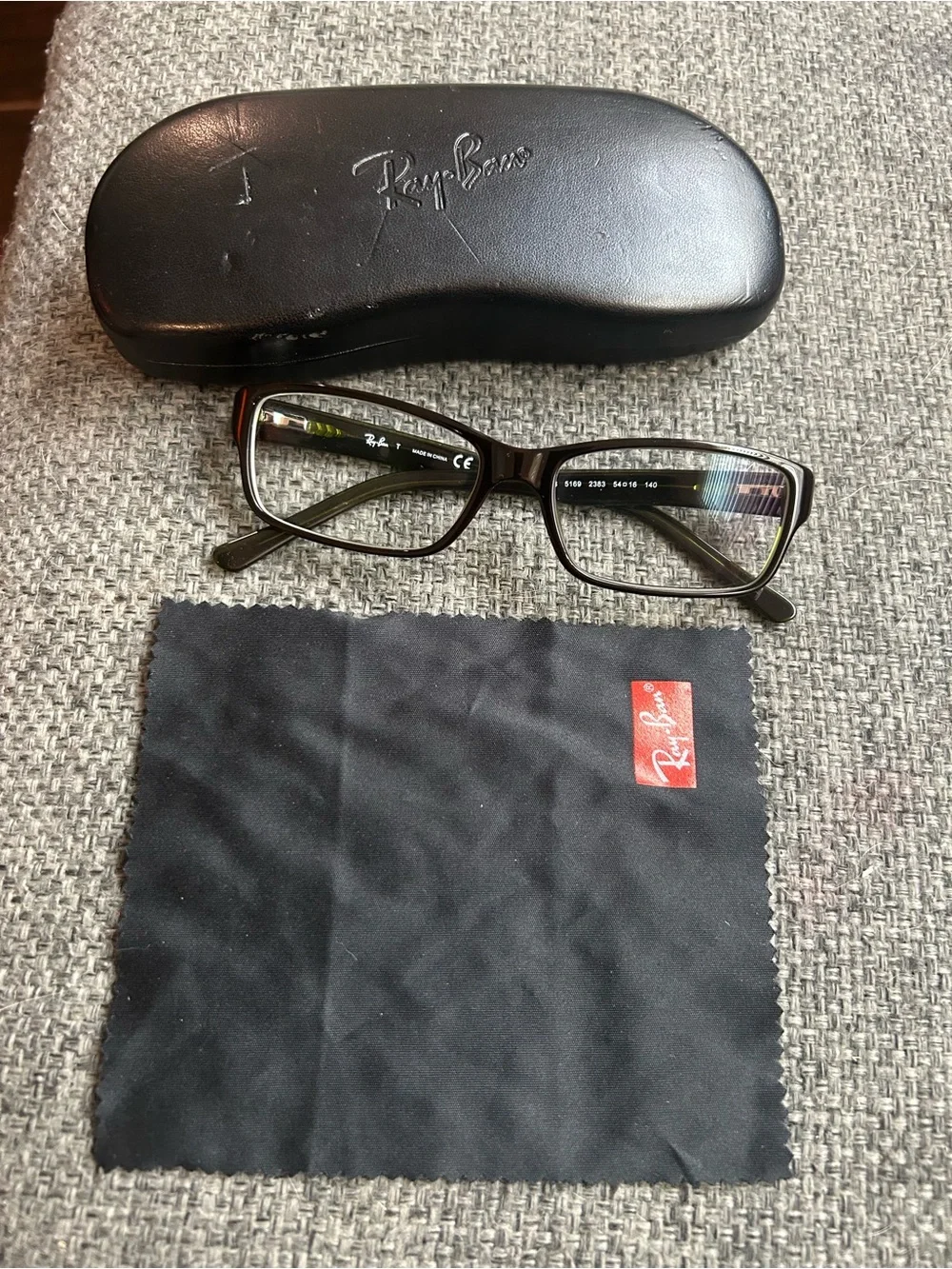 Ray-Ban RB5169 Optics Eyeglasses in a polished Havana-on-green acetate rectangle